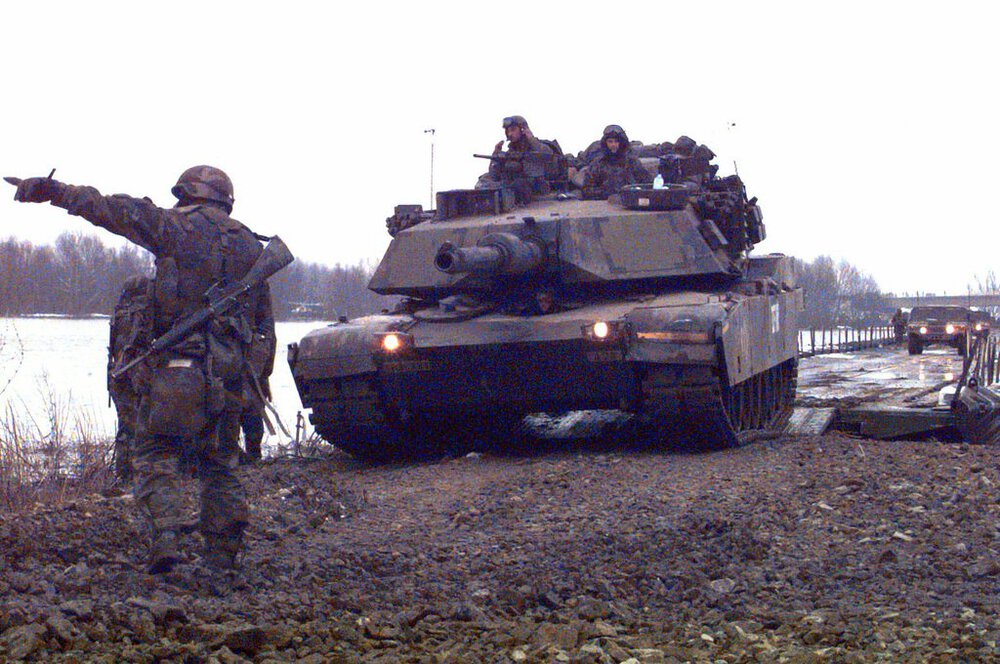a-soldier-from-the-502nd-engineer-company-directs-an-m1a1-abrams-tank-from-6a1d5d-1024.jpg