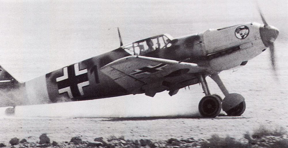 Messerschmitt-Bf-109E7Trop-2.JG27-Black-1-Erich-Gerlitz-taxing-North-Africa-1941-01.thumb.jpg.ef0c9080fa70b20e8f834fa2b1bdb0a0.jpg