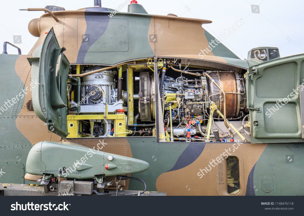 stock-photo-iwakuni-japan-may-a-close-up-of-the-powerful-engine-of-a-bell-cobra-attack-helicopter-1148476118.thumb.jpg.a91ad5a3ea733c57b93f97b78a200f8f.jpg