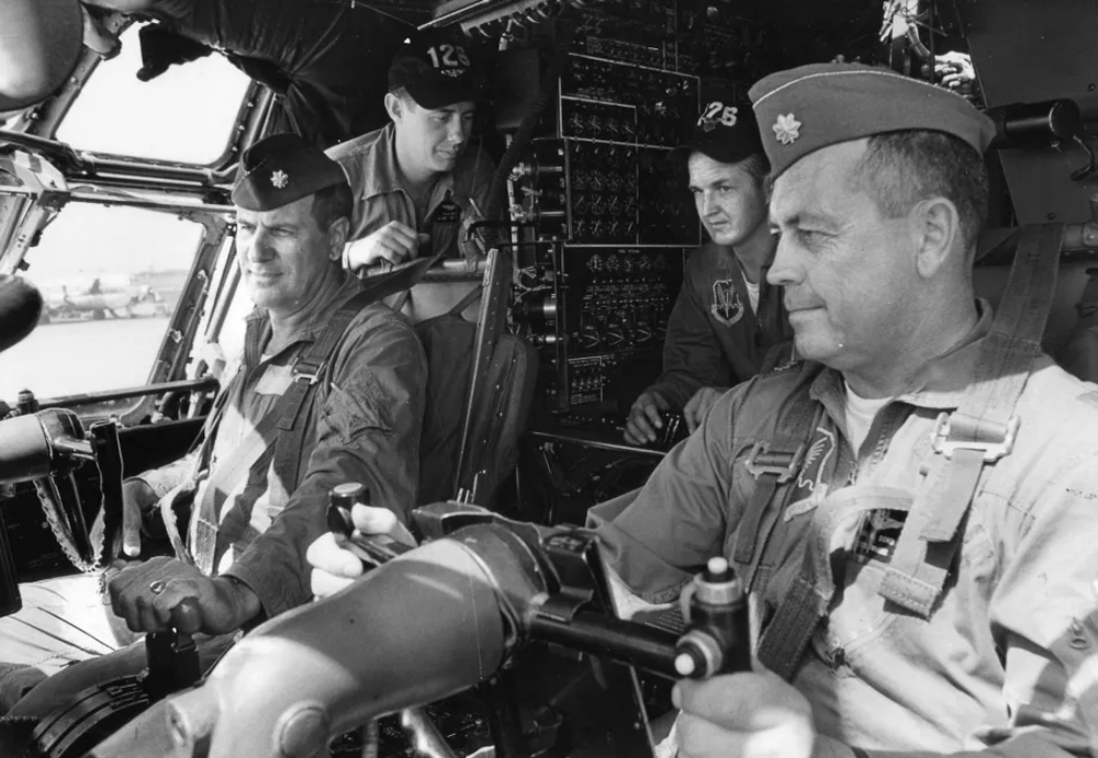 Lt. Col Paul Dowd,, lt-col-paul-poberezny-left-sits-at-the-controls-of-a-plane-at-mitchell-airport-before-two-weeks-of-exercises-for-the-wiscons_zps60f8b5e8.jpg.png