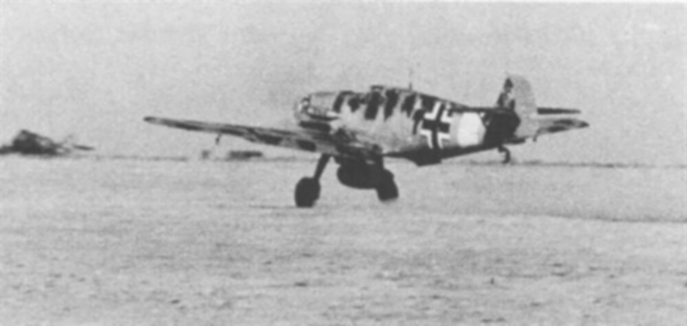 Messerschmitt-Bf-109E7Trop-2.JG27-Black-1-Erich-Gerlitz-taking-off-Libya-1941-ebay-01.thumb.jpg.2bf623274a9a59f9ae87b52952fb6bc9.jpg