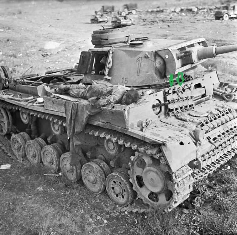 Body_of_German_Soldier_on_Panzer_III_1_February_1943.jpg